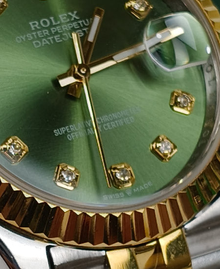rolex oyster perpetual truetone with green dial with date