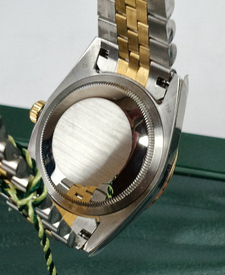 rolex oyster perpetual truetone with green dial with date