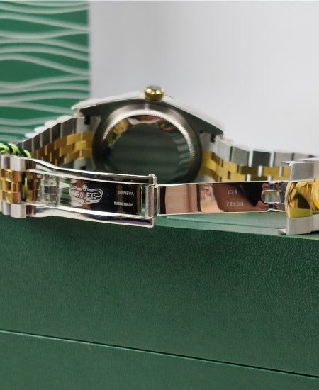 rolex oyster perpetual truetone with green dial with date