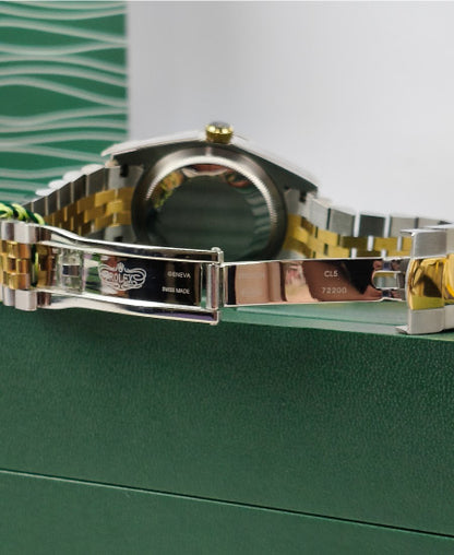 rolex oyster perpetual truetone with green dial with date