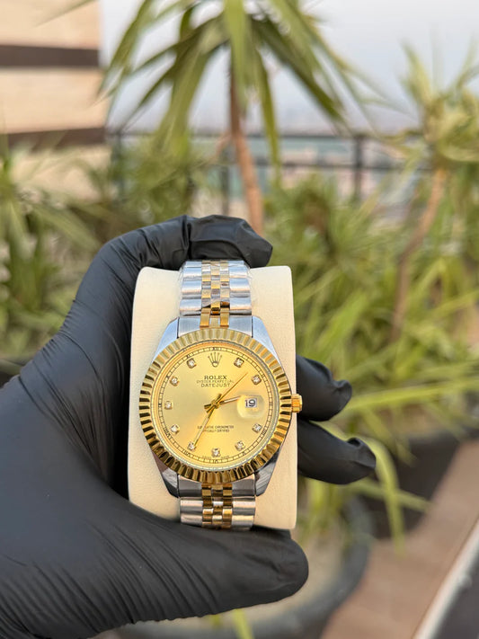 rolex oyster perpetual truetone with golden dial with date