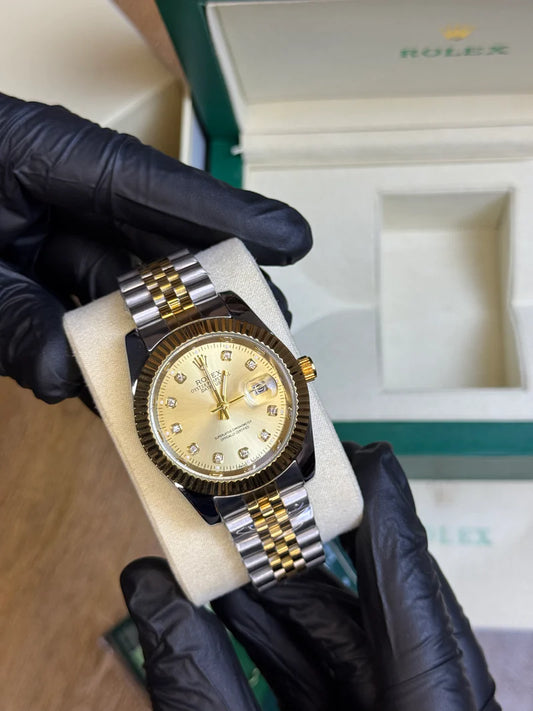 rolex oyster perpetual truetone with golden dial with date