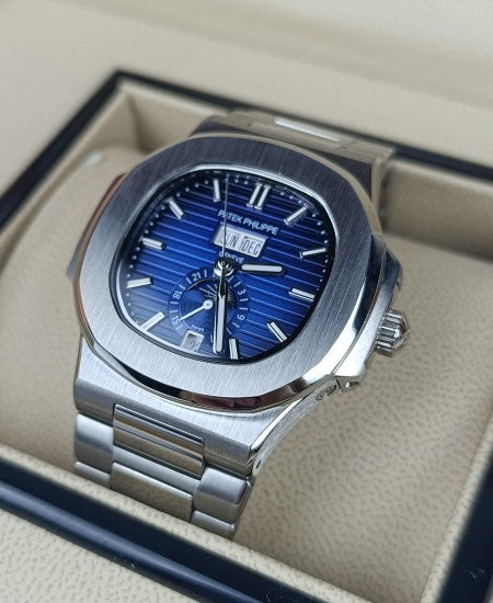 pp silver with blue dial with date