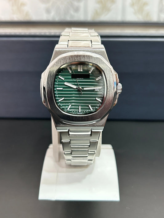 pp silver with green dial with date